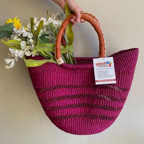 Fair-trade pink open weave basket, perfect for markets and the beach, made in Africa. Perfect Mother's Day gift.