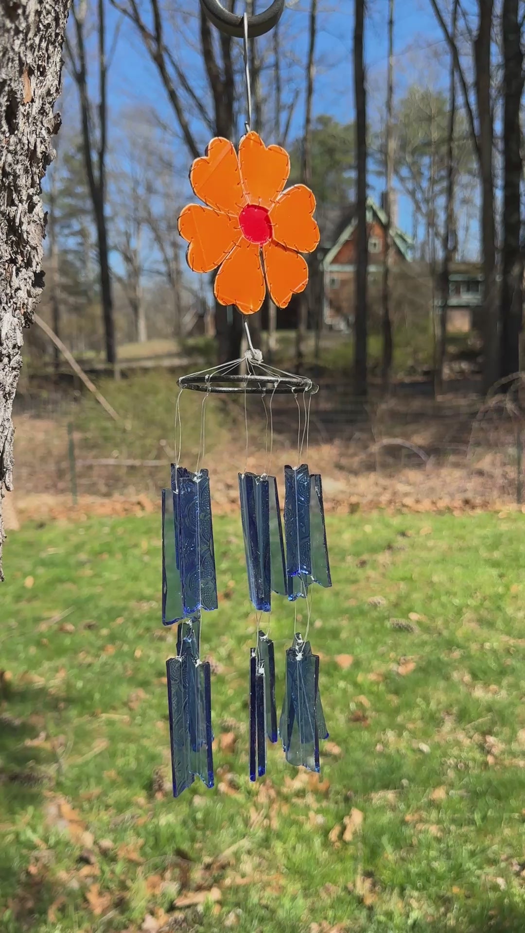Orange flower glass wind chimes, handmade in Africa.
