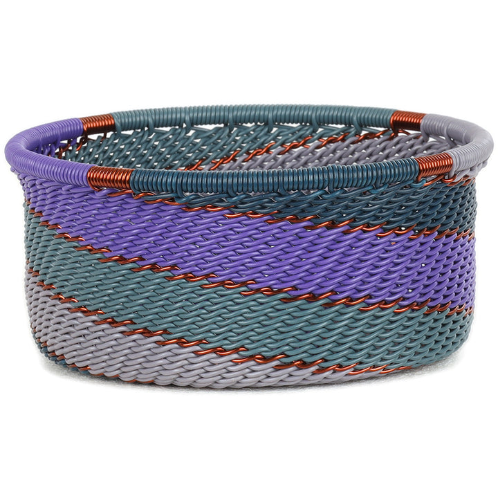 Handwoven Zulu Wire Tuna Cup Baskets in Purple from South Africa in a variety of colorful and neutral artisan patterns.
