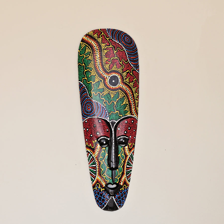 Hand painted African mask with colorful rainbow dot pattern for wall decor
