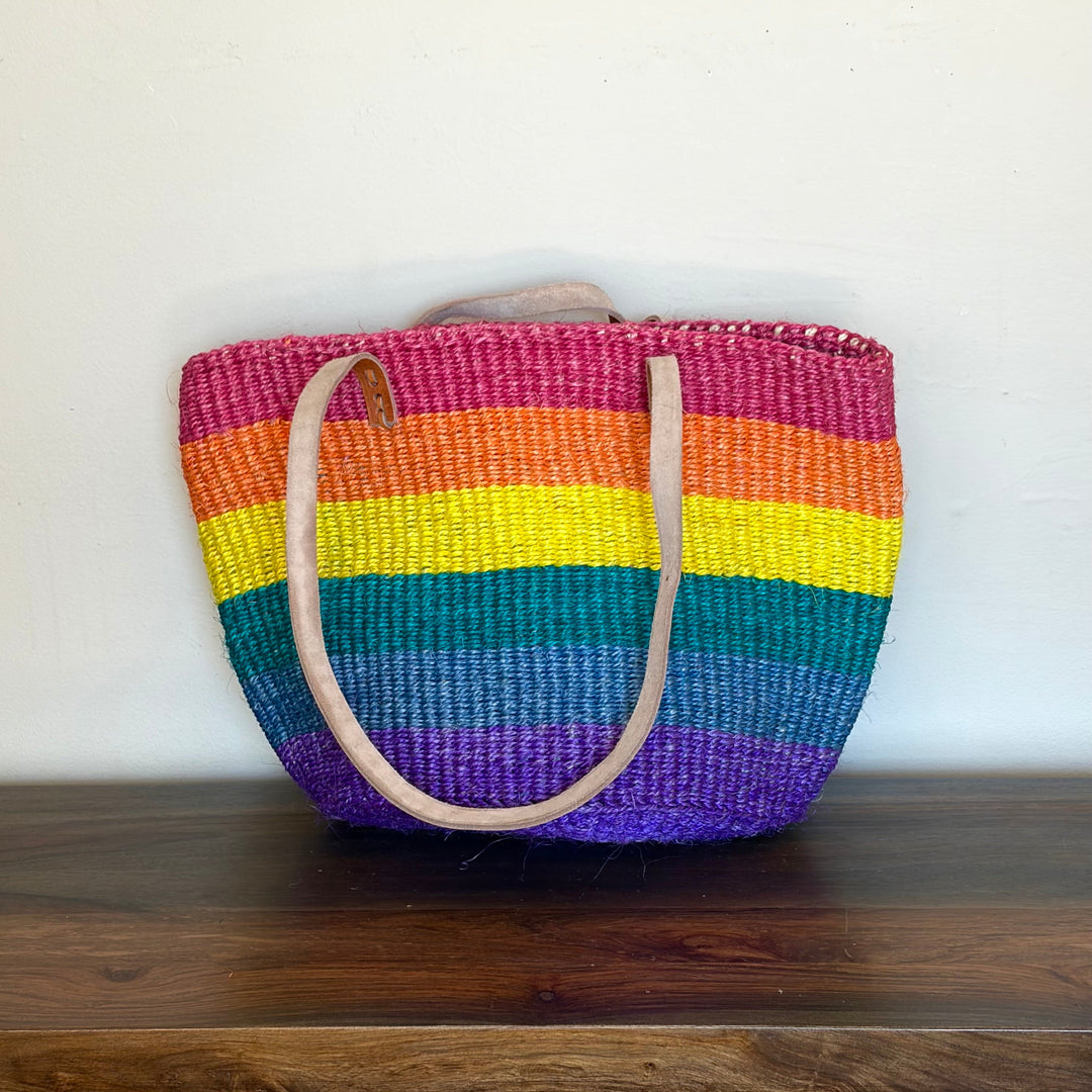 Our Rainbow sisal tote bag is handmade in Africa. Great for Pride or for everyday.