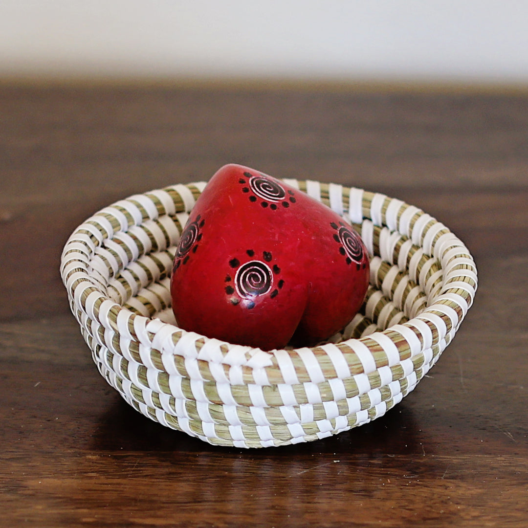 Hand carved red soapstone heart decor made by artisans in Kenya.