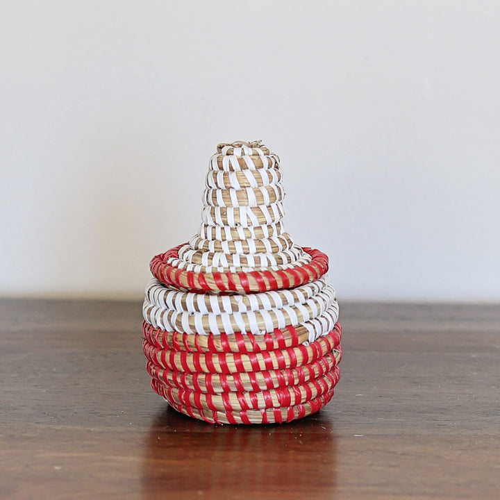 Red and white handwoven mini sweetgrass wishing basket with fitted lid.