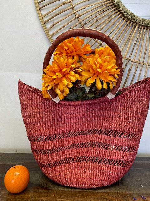 Fair-trade red open weave basket, perfect for markets and the beach, made in Africa. Great hostess gift and even a gift for yourself.