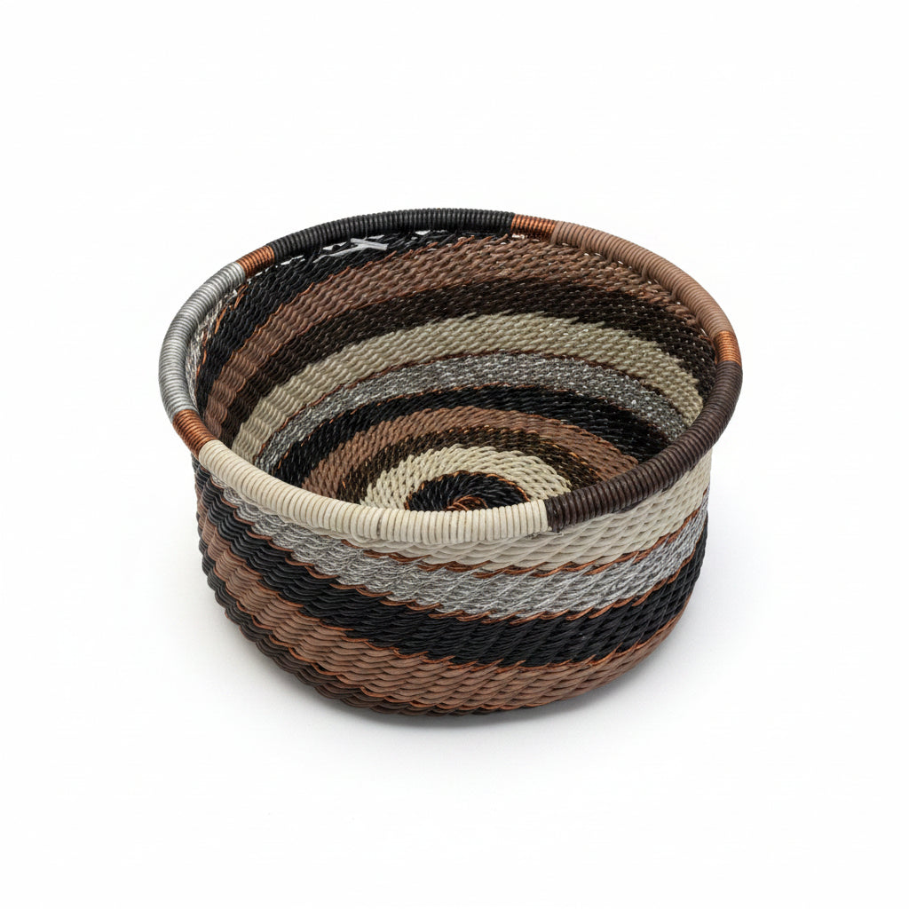 Handwoven Zulu Wire Tuna Cup Baskets in Silver Sand from South Africa in a variety of colorful and neutral artisan patterns.