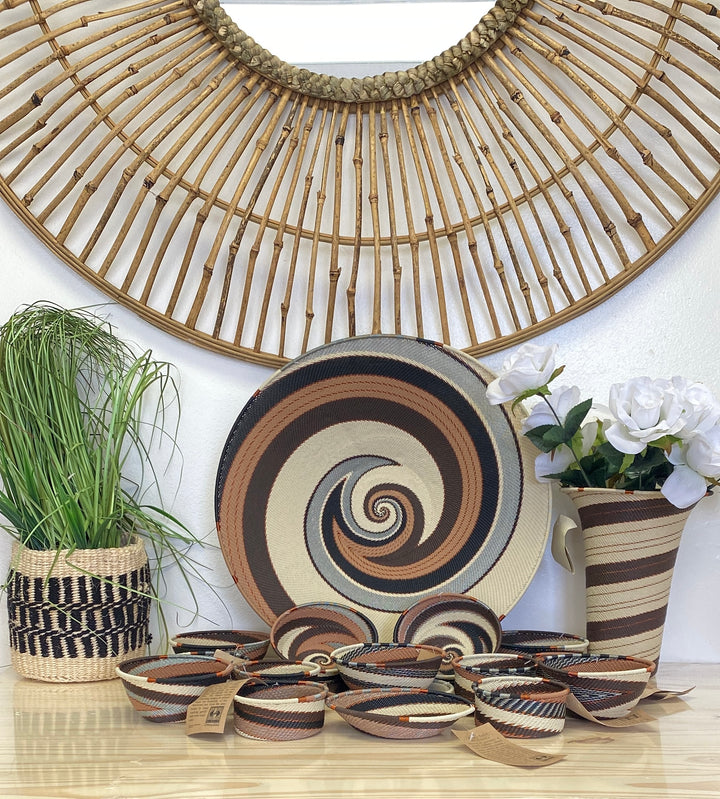 Assorted Silver Sands Zulu Wire Baskets handwoven in South Africa in soft ivory, silver gray, sand, brown, and charcoal tones.