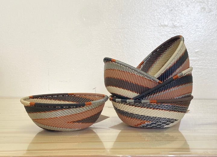 Silver Sands Zulu Wire Small Wide Bowl handwoven in South Africa in soft ivory, silver gray, sand, and earthy brown tones.