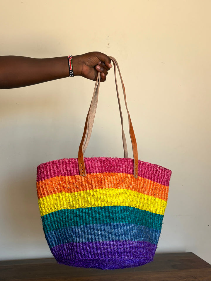 The sisal rainbow striped tote bag is perfect for summer, the beach, and everyday! Make a statement!
