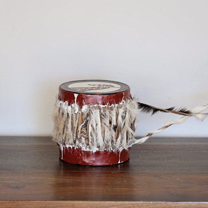 Small handmade Kenyan drum with goat skin and traditional carved wood and a giraffe hand-painted on the top.