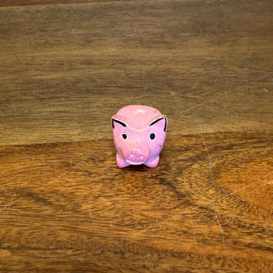 Small soapstone pig figurine hand-carved in Kisii Kenya in pink color finish.