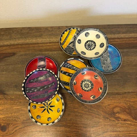 Assorted colorful soapstone bowls hand-carved in Kenya from Kisii stone