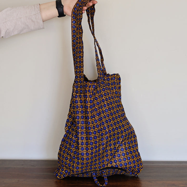 Sustainable reusable African fabric tote bag for groceries and travel.
