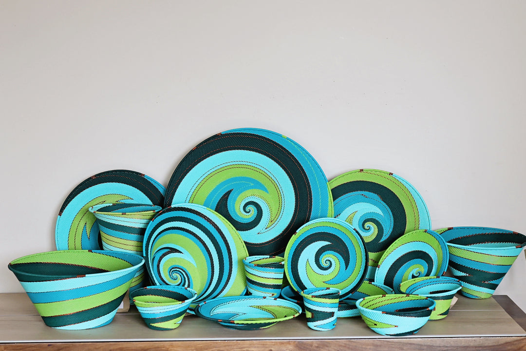 Assorted Teal Zulu Wire Baskets handwoven in South Africa in teal, turquoise, aqua, lime green, and deep green patterns.