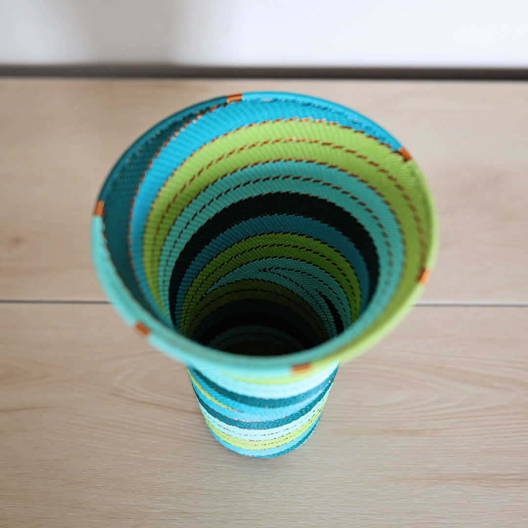 Teal Zulu Wire Flared Top Vase handwoven in South Africa in teal, turquoise, aqua, and green.