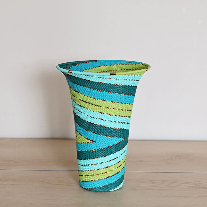 Teal Zulu Wire Flared Vase handwoven in South Africa in teal, turquoise, aqua, and green.