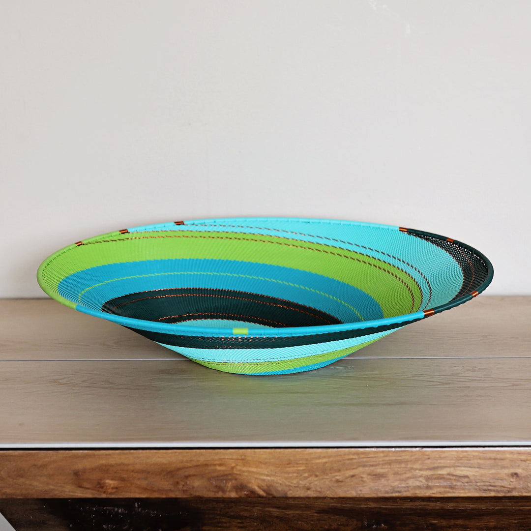 Teal Zulu Wire Large Shallow Basket handwoven in South Africa in teal, turquoise, aqua, and green.