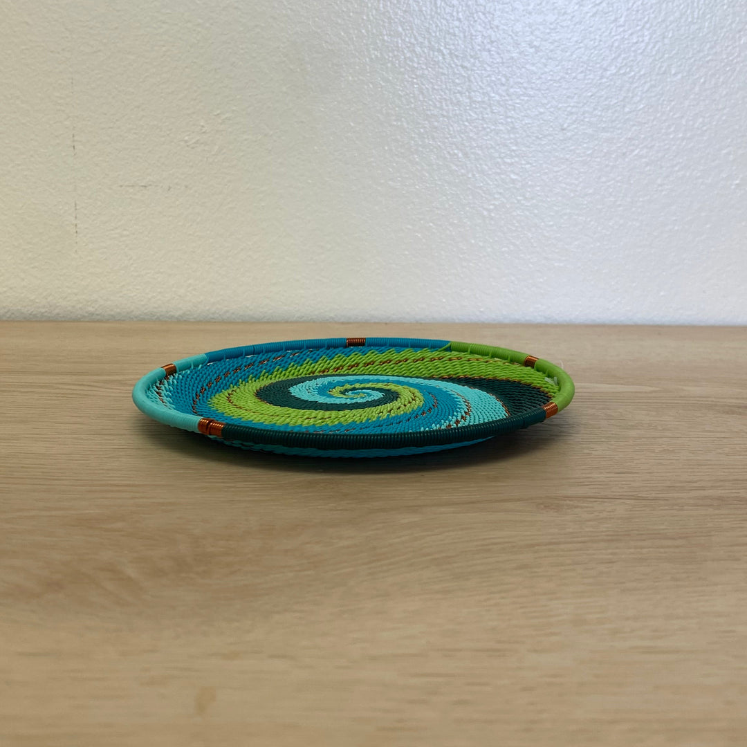 Handwoven Teal Zulu Wire small tray with a bold teal and lime green pattern.