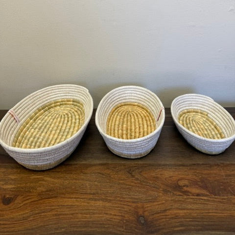 Three sizes, small, medium and large, of our bread baskets in oval.