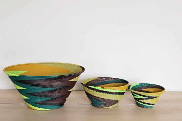 Handwoven South African Forest Zulu Wire baskets with intricate graphic patterning.