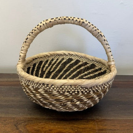 Tonga basket bowl with handles woven in Munyumbwe Zambia using palm leaf and vine structure