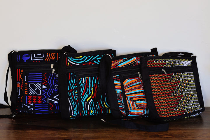 Unisex travel crossbody bag made from colorful African textiles