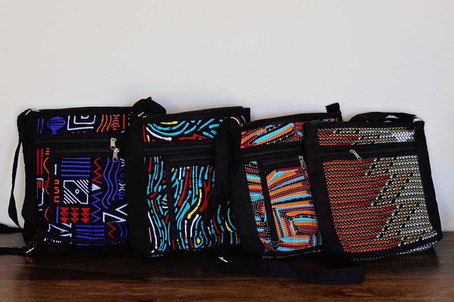 Unisex travel crossbody bag made from colorful African textiles