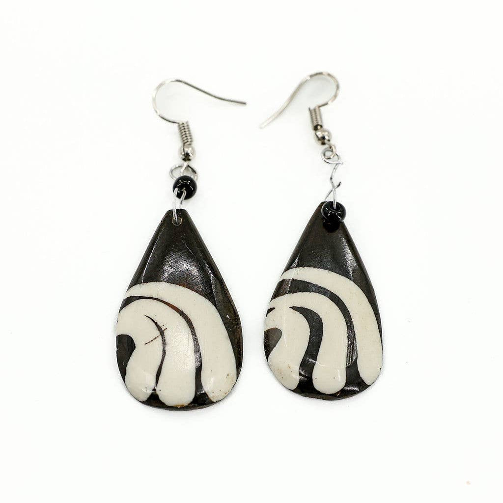 elongated tear drop earrings in black and white bone on fish hook