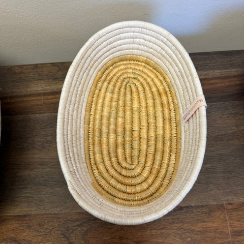White cloth lined bread basket bowl woven serving basket handmade under fair trade standards
