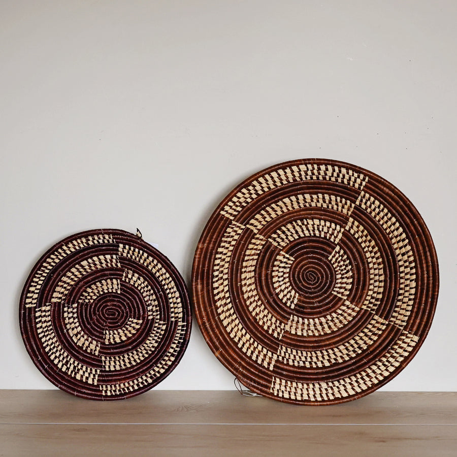 Handwoven Woven Earth Bukedo and Raffia bowl handmade in Uganda featuring warm chocolate and natural woven patterns for fair trade home décor.