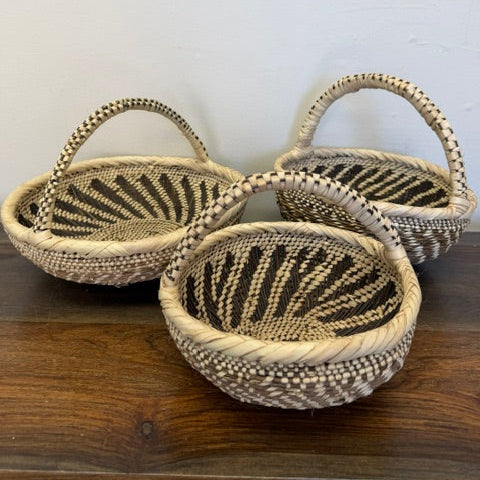 Zambia Tonga handled basket bowl with double wall weave and geometric interior pattern