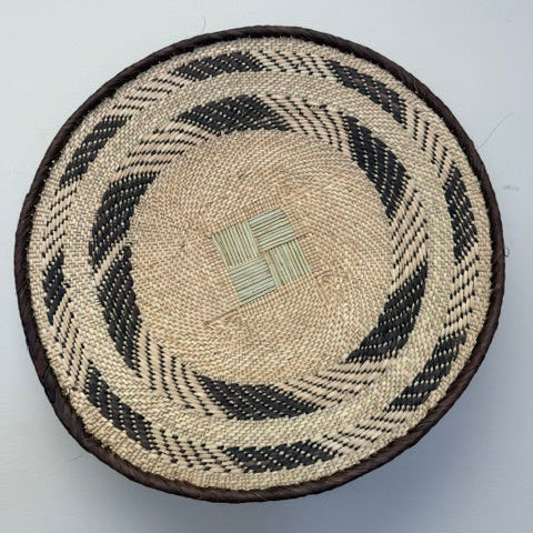 Zimbabwe Binga palm bowl with coiled rim and herringbone pattern handmade by artisans