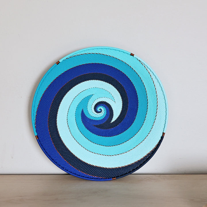 Ocean Zulu wire small tray basket handwoven by South African artisans in turquoise, navy and cobalt blue.