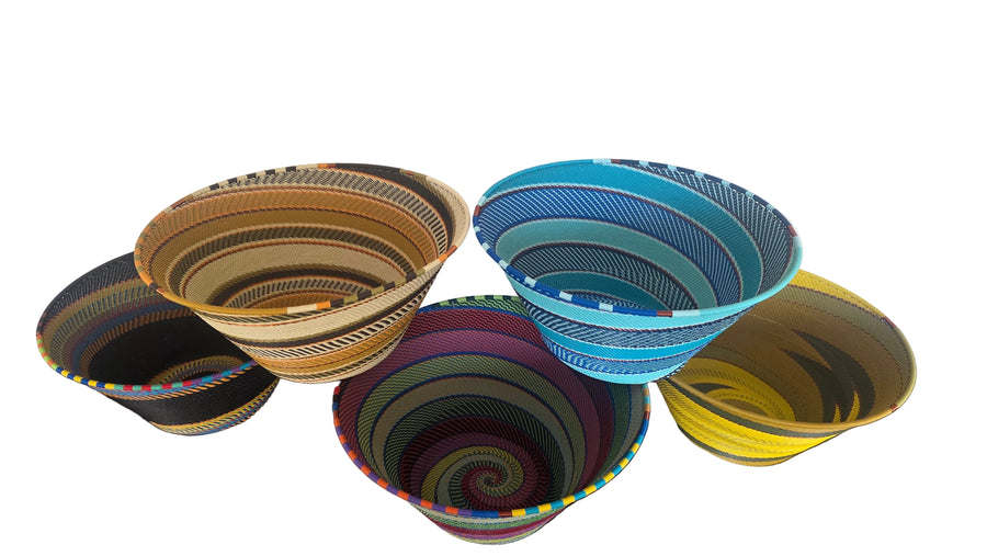 Handwoven Zulu wire bowl from South Africa featuring colorful geometric patterns