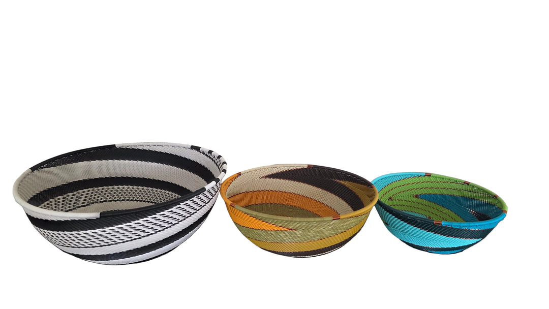 Handwoven Zulu wire round bowl from South Africa with colorful geometric woven pattern